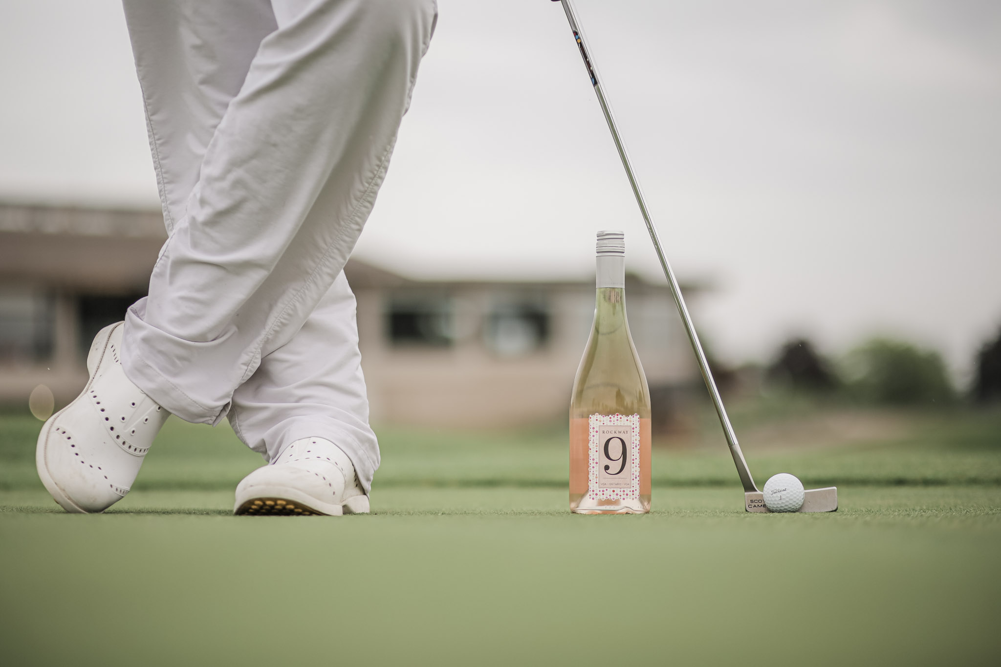 a bottle of wine on the golf course